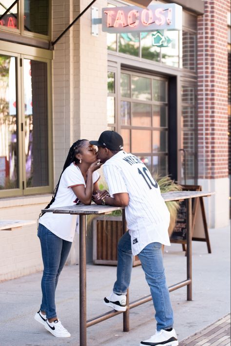 Save the date photoshoot. Taco stand shot Couples Sneaker Photoshoot, Sneaker Engagement Photos, Sporty Engagement Photos, Sneakerhead Couples, Save The Date Photoshoot, Date Photoshoot, 2025 Bride, Themed Engagement Photos, Engagement Themes