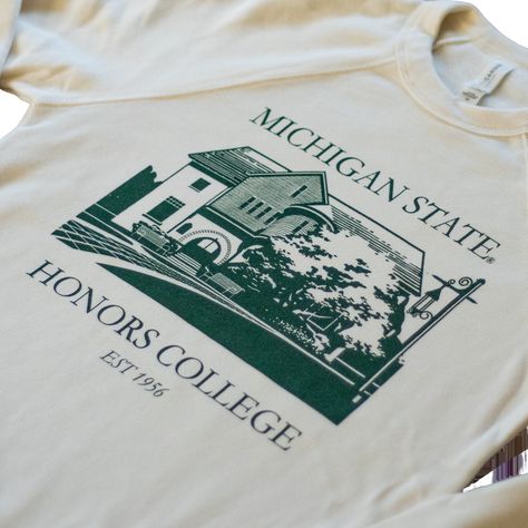 This sweatshirt has a vintage look and fleecy feel. Available in the color natural, it has a dark green imprint of historic Eustace-Cole Hall and features the text “Michigan State University”, “Honors College”, and “Est 1956”. 52% cotton/48% polyester Machine wash cold gentle Available in natural Unisex sizing Made in USA College Club Merch Ideas, College Merch Aesthetic, College Merch Ideas, School Sweatshirts Designs, College Spirit Wear, Honors College, School Merch, University Merch, College Merch