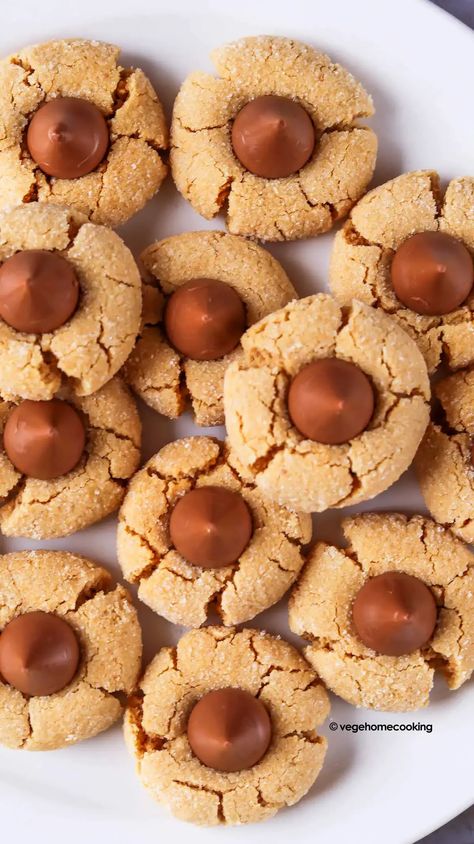 Eggless Peanut Butter Blossom Cookies Eggless Christmas Cookies, Peanut Butter Blossom, Christmas Cookies Recipes, Egg Free Baking, Peanut Blossoms, Peanut Butter Blossom Cookies, Blossom Cookies, Eggless Recipes, Peanut Butter Blossoms