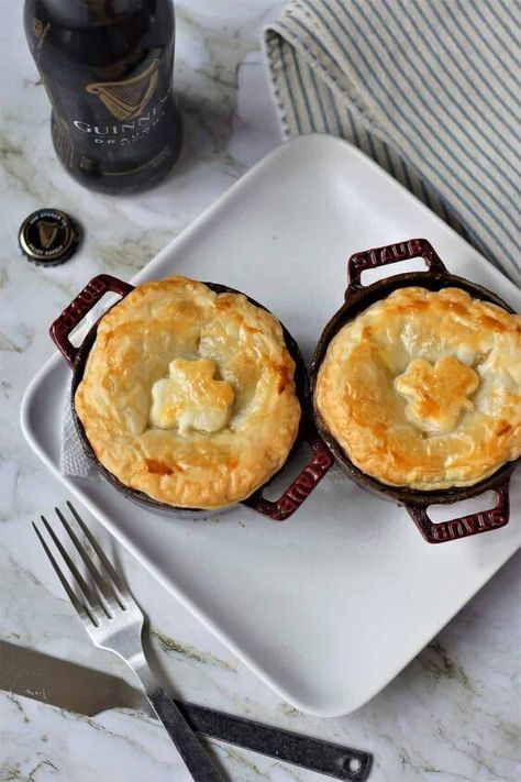 Along with staples like corned beef and cabbage, soda bread, and colcannon, this Irish Steak and Guinness Pie has become one of our favorite St. Patrick’s Day recipes. Tender morsels of steak are combined with sautéed root veggies and mushrooms in an Irish stout and beef sauce before being sealed up and baked with a flaky and buttery puff pastry crust. Making the Irish Beef and Stout Pie Gather your ingredientsTo make the Beef and Guinness pie you will need the following ingredient… Traditional Irish Cottage Pie, Irish Meat Pie, Irish Christmas Desserts, Irish Pie, Savory Hand Pies Recipes, Steak And Guinness Pie, Pie Savory, Beef And Guinness Pie, Beef And Mushroom Pie