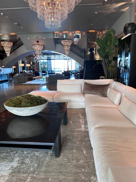 Modern white sectional sofa and dark wood coffee table with green plant on top White Sectional Couch, Restoration Hardware Couch, Dark Wood Living Room, Dark Wood Coffee Table, White Sectional, Luxury Living Room Decor, Retail Concepts, Wood Coffee Table, Family Rooms