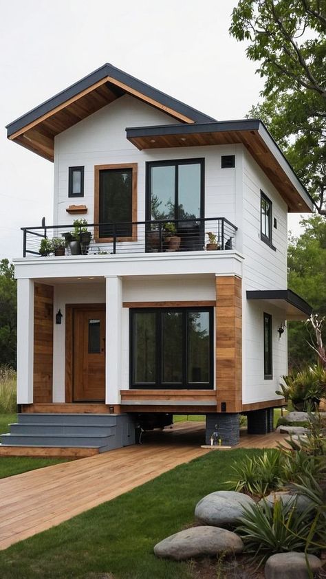 Discover modern tiny house ideas with stunning design, floor plans, layout options, and small homes designs. Explore interior design concepts for small homes, including floor plans, interior design, loft layouts, and exterior design ideas. Plan your dream tiny home that maximizes space and style. Tiny House For Family Of 4, Small House Aesthetic, Traditional Small House, Loft House Exterior, Small Rest House Design, Tiny Modern House, Tiny House Exterior Ideas, Small Cabin Floor Plans, Small House Design Floor Plan