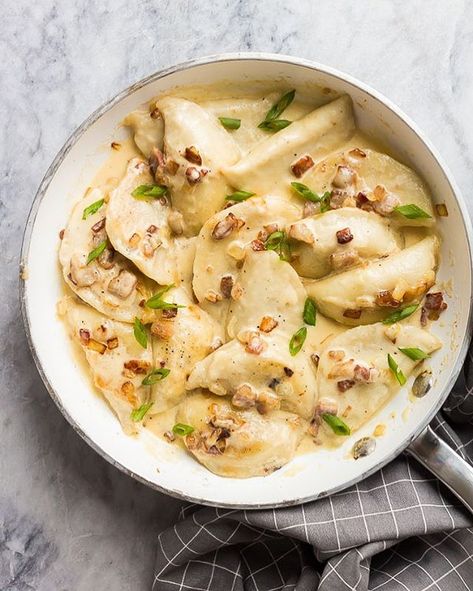 Crispy bacon, sautéed onions, and cheese-filled perogies in a luscious creamy sauce Christmas Side Dish, Perogies Recipe, Recipe With Bacon, Pierogi Recipe, Christmas Side, Christmas Side Dishes, Bacon Recipes, International Recipes, Sauce Recipes