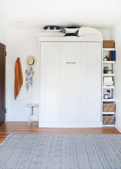 See how we created a guestroom within our office using a murphy bed. Click for the full before & after! Bed Closet, Armoire Ikea, Simple Bed Designs, Murphy Bed Ikea, Murphy Bed Desk, Modern Murphy Beds, Murphy Bed Diy, Murphy Bed Plans, Bed Shelves