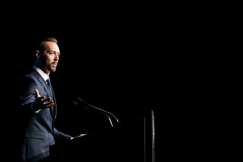 When on location at an event, using the available lighting to create compelling and engaging images is the hallmark of a great photographer. The speaker in this case was framed in negative space to highlight the importance of who he is and what he has to say. #conference #businessconference #eventphotography #eventplanning #keynotespeaker #eventphotographysydney #sydneyevents #corporateevents #corporateeventphotography Speakers Photography, Conference Photography, Conference Speaker, Business Conference, Sydney City, Professional Event, Keynote Speaker, Public Speaker, Guest Speakers