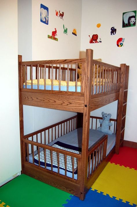 Recently I came across the image above of small bunk beds in the shared bedroom of 4-year-old twins and realized I'd never seen mini bunks like this. They are the same size as a toddler bed (i.e. the size of a crib mattress) and offer a stop-gap solution for parents looking to eke out another year or two in their current space. Small Bunk Beds, Toddler Bunk Bed, Bunk Bed Crib, Kura Bunk Bed, Bunk Beds For Girls Room, Ikea Bunk Bed, Bunk Beds Small Room, Bunk Bed Safety, Bunk Beds For Boys Room