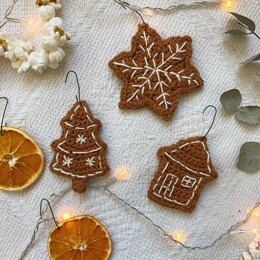 DK Crochet Patterns | LoveCrafts Gingerbread Biscuits, Appliques Au Crochet, Crochet Brooch, Crochet Xmas, Crochet Christmas Trees, Golden Pattern, Holiday Crochet, Crochet Christmas Ornaments, Christmas Crochet Patterns