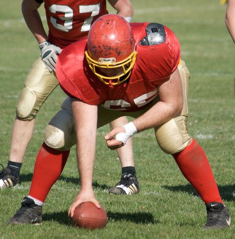 Center is a position in American football and Canadian football . The center is the innermost lineman of the offensive line on a football team's offense. The center is also the player who passes the ball between his legs to the quarterback at the start of each play. Louis Sachar, Canadian Football, Math Problem, Math Time, Love Math, Sports Training, A Football, Talent Show, American Football