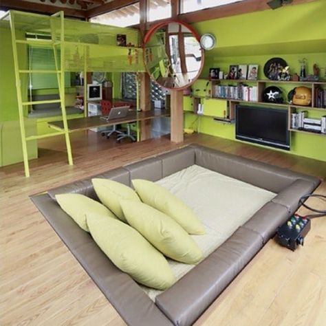 Pin for Later: These 19 Crazy Kids' Rooms Will Make You Want to Redecorate Immediately Bunker Style Ladders, video games, and an in-ground bed! Trampoline Bed, Weird Beds, Youth Rooms, Backyard Trampoline, Build A Playhouse, Youth Room, Accent Throw Pillows, Awesome Bedrooms, Cool Beds