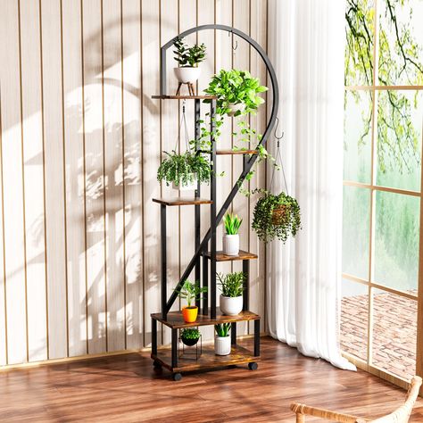 PRICES MAY VARY. 71in Indoor Plant Stand with Wheels：Different from other short stand, we are 71 IN super tall! The all-in-one plant stand will meet your much more needs to put all kinds of pots and flowers! The frame of this metal plant stand is made of heavy-duty iron pipe that is 0.9mm thick. It has a sturdy structure and a high load-bearing capacity. The surface of the iron pipe is coated with special baking paint to avoid rust. Equipped with 4 universal wheels with brakes, easy to move 360° Plant Stand With Wheels, Moon Plant, Flower Pot Stand, Balcony Patio, Art Deco Bedroom, Deco Bedroom, Outdoor Living Decor, Metal Plant Stand, Pot Stand