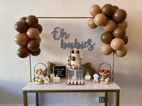 Throw a super cute bear-themed birthday party for your twins and decorate an adorable dessert table for a delightful display of sweet treats. Position an over-the-table gold stand and embellish it with chocolate-colored balloons to perfectly complete the theme while also highlighting your unique dessert display. Arrange cake stands, cupcake stands, and serving trays on the table and enhance the adorability of your setup with mini easel stands displaying cute accents. Chocolate Themed Birthday Party Decorations, Cupcake Setup Display, Book Themed Birthday Party, Event Decor Ideas, Party Decorations Table, Vendor Table, Mini Easel, Cupcake Stands, Balloon Display