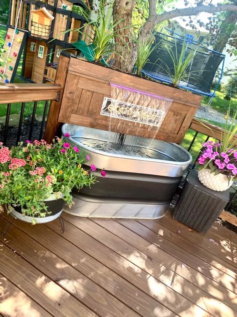 Given that we were in the process of restoring our back deck what better time than now to install an awesome water feature. Determine layout On this deck all existing structure was maintained we simply redid the top deck boards post and rails. This little corner angle happened to be the perfect location for what I had in mind. Test fit Using a 4ft water trough I positioned between the two post to make sure it would fit as intended without taking up too much deck space. This sizing wa… Water Pump Cover Ideas, Deck Water Feature, Plain Backyard, Farm Tips, Mind Test, Hand Water Pump, Water Ideas, Faux Fireplace Mantels, Brain Storming