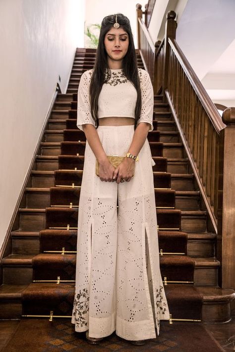 Roka outfit inspiration | Outfit by Rina Dhaka | Merry Kaufer | Indian brides | Bride to be | Off-White embellished crop top and palazzo | Roka looks inspiration | Indo western outfits | Borla maang teeka | Bridal couture | Roka ideas | Plazzo pants | Crop top | Bridesmaids | Indian Outfit | #wittyvows #indianwedding #trousseau #bridetobe #indianbride #fashion #indianwear #love #bride #bridal #bridesmaids #plazzo #croptop | Ethnic Clothes, Salwar Kamiz, Indian Brides, Traditional Indian Outfits, Indian Gowns Dresses, Indian Bridal Fashion, Indian Gowns, Ethnic Outfits, Designer Party Wear Dresses