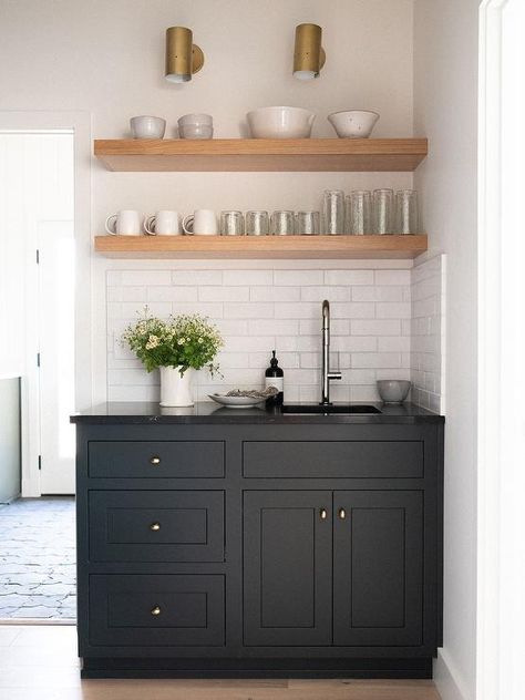 Black Kitchen Cabinets with Brass Oval Knobs - Cottage - Kitchen Wet Bar With Floating Shelves, Moody Pantry, Bar With Floating Shelves, Black Countertop, Basement Kitchenette, Home Wet Bar, Black Floating Shelves, Home Bar Rooms, Floating Shelves Kitchen