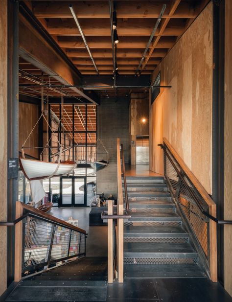 A Sustainable Boat Center Sets Sail - gb&d Olsen Kundig, Boat Workshop, Nautical Architecture, Luxury Showroom, Workshop Architecture, Thesis Inspiration, Wooden Workshops, Olson Kundig, Butterfly Roof