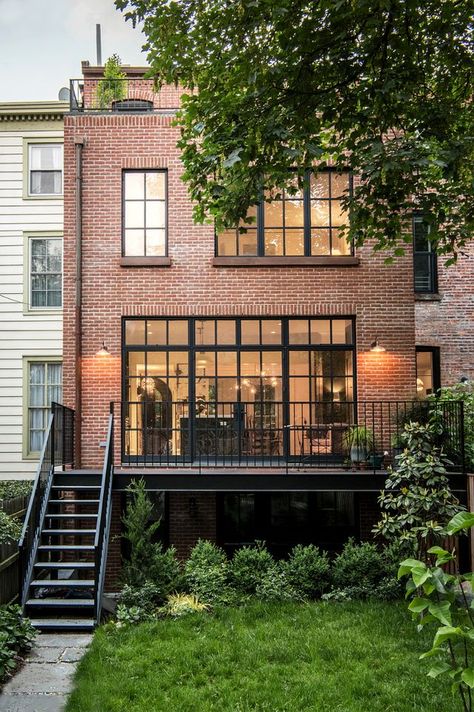 With timeless classic style this Brooklyn townhouse has been completely renovated, restored and new additions added. All the windows were replaced, with black steel windows on the garden facing new ad Modern Brick House, Brick House Designs, Elizabeth Roberts, Brooklyn Brownstone, Exterior Stairs, Stairs Architecture, Townhouse Designs, Windows Exterior, Design Exterior