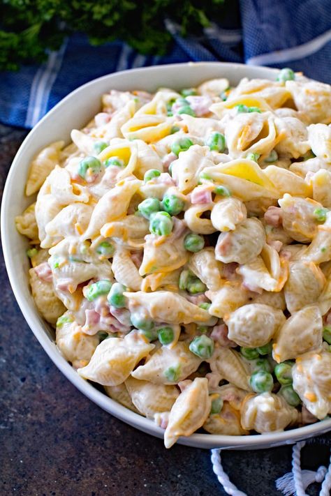 A Classic Macaroni Salad that is a hit at all my parties and BBQs with both kids and adults. It's quick, easy and delicious which makes it the perfect side dish. Make it for summer parties, 4th of July or a potluck! #macaroni #salad #macaronisalad #pastasalad #pasta #recipe #recipeinspiration #recipeidea #julieseatsandtreats Shell Macaroni Salad, Shell Pasta Salad, Cold Pasta Recipes, Snacky Foods, Salad Macaroni, Shell Pasta, Classic Macaroni Salad, Seven Layer Salad, Cold Pasta Salad Recipes