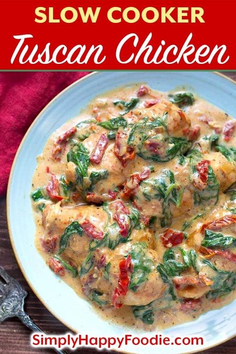 Slow Cooker Creamy Tuscan Chicken recipe is a simple meal to make. With tender chicken breasts, sun dried tomatoes, and a creamy Alfredo sauce, this crock pot tuscan chicken recipe is a delicious meal. slow cooker Tuscan chicken recipe, crock pot Tuscan chicken breasts recipe by simplyhappyfoodie.com #slowcookercreamytuscanchicken #slowcookerchickenbreasts #crockpottuscanchicken #crockpotchicken Crockpot Tuscan Chicken Recipes, Tuscany Chicken Recipe, Tuscan Chicken Crockpot, Crockpot Tuscan Chicken, Slow Cooker Tuscan Chicken, Slow Cooker Italian Chicken, Crock Pot Tuscan Chicken, Creamy Tuscan Chicken Recipe, Tuscan Chicken Recipe