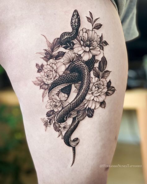 A beautiful thigh piece tattoo of snake and flowers done by Fernando Rod Of Asclepius Tattoo Feminine, Floral Tattoo Ideas, Snake And Flowers Tattoo, Tattoo Ideas For Woman, Snake And Flowers, Different Hobbies, Thigh Piece Tattoos, Forearm Cover Up Tattoos, Floral Thigh Tattoos