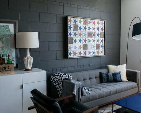 22 Fun and Cheap Ideas for DIY Cinder Block Projects Decorating Cinder Block Walls, Industrial Decor Living Room, Concrete Block Walls, Cinder Block Walls, Black Accent Walls, Grey Couch Living Room, Basement Makeover, Basement Walls, Cinder Block