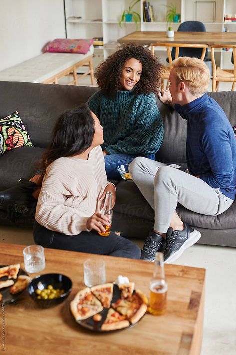 Diverse group of smiling young friends talking together while eating pizza and drinking beer in their living room at home Friends Eating Pizza, Two People Talking, Friends At Home, Friends Talking, Polaroid One Step, Beer Photography, Eating Pizza, Friends Instagram, Friends Laughing