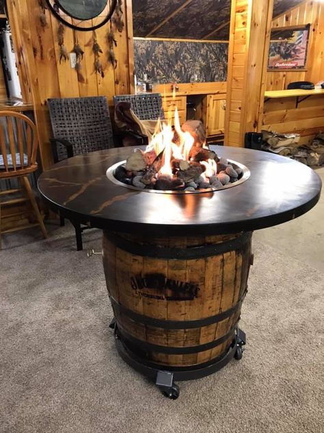 This is an authentic Jack Daniels whiskey barrel reinvented into a beautifully unique fire pit.  This fire pit has a high performance custom concrete table top and can be set up for hookup to a propane tank or natural gas.  The burner and burner pan are made of high grade 314 stainless steel.  The concrete top can be customized for each individual customer's preferences. Wine Barrel Fire Pit, Barrel Fire Pit, Concrete Tables, Concrete Table Top, Taman Air, Barrel Projects, Wine Barrel Furniture, Barrel Decor, Bar Tops