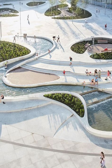 This hybrid of skatepark, playground and urbane living room is the perfect venue for a young, dynamic society. Cyclists and scooters cruise along organically curved levels, between them oases of tranquility, water features, cafes and restaurants. Learn more at Architonic.com  #architonic #architecture #landscapearchitecture #landscapedesign #parkdesign #publicspace #urbandesign #urbanarchitecture #architecturephotography Curve Building, Playgrounds Architecture, Water Architecture, Architecture Blueprints, German Architecture, Urban Development, Innovative Architecture, Architecture Design Sketch, Architecture Concept Drawings