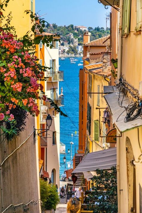 Narrow streets and historic houses of old town with Rue de lEglise street in Villefranche-sur-Mer resort town in France Antibes France Old Town, Old Town Aesthetic, Nice Old Town, France Street, Antibes France, Italian Street, Historic Houses, Beautiful Streets, Old Street