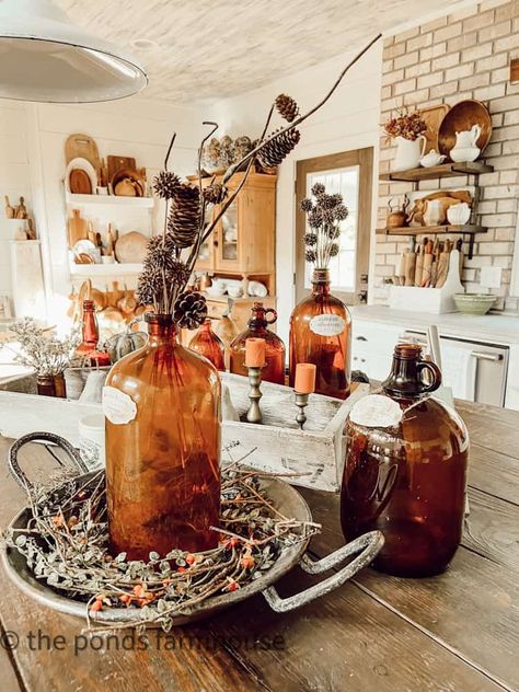 Decorating With Amber Bottles, Amber Bottles Decor, Decoration Table Ideas, Old Coke Bottles, Budget Friendly Decorating Ideas, Old Milk Bottles, Vintage Soda Bottles, Vintage Fall Decor, Vintage Milk Bottles