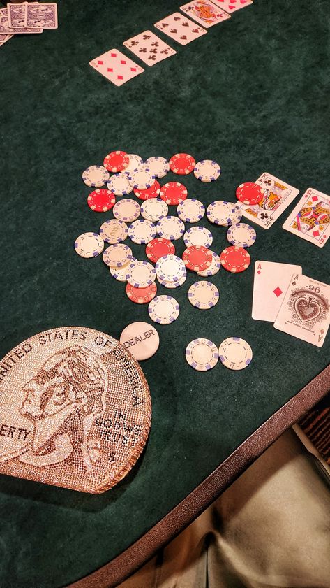 A poker table strewn with chips featuring a crystal encrusted evening bag shaped like a united states quarter. 20th Birthday Dinner, Casino Royale Theme Party, Casino Prom, Aesthetic Birthday Party, Dessert Night, Casino Aesthetic, Casino Birthday Party, 21 Party, Casino Royale Theme