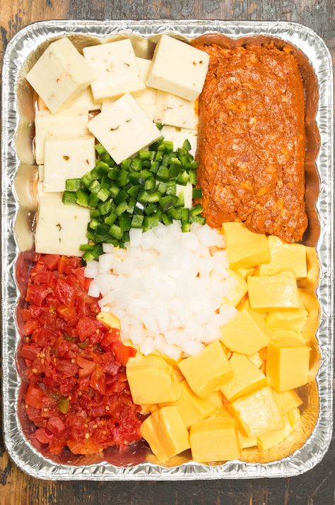 Smoked queso has been going viral all summer for a reason - it's one of the most delicious, cheesy recipes you can make in the smoker! Velveeta cheese, pepper jack, tomatoes, peppers, onions, pork chorizo, and more make this a tasty dip! #cheese #queso #appetizers Smoked Queso With Chorizo, Smoked Queso Dip With Chorizo, Smoked Queso Dip On Smoker With Chorizo, Smoker Queso Recipe, Smoked Peppers In Smoker, Smoked Chorizo Queso Dip, Smoked Cheese Dip In Smoker, Smoked Queso Dip On Smoker, Smoker Queso