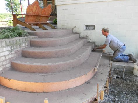 With a second color of dye powder in a mold release, the steps were pounded with a stamp to make a random stone-like pattern. Description from homejoys.blogspot.ca. I searched for this on bing.com/images Curved Concrete Steps, Curved Front Steps, How To Pour Concrete Steps, Curved Patio Steps, Backdoor Steps To Patio, Stamped Concrete Steps, Curved Steps, Concrete Front Steps, Concrete Porch Steps