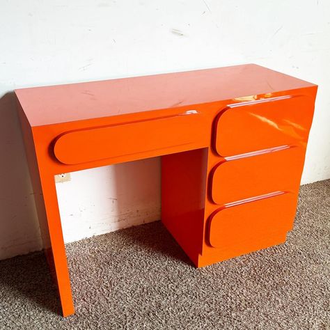 Add a vibrant splash of color to your workspace with this Postmodern Orange Lacquer Writing Desk. Featuring a striking orange laminate… | Instagram Postmodernism Interior Design, Funky Rooms, Rooms Desk, Postmodern Furniture, Funky Desks, Personal Room, Pink Office Decor, Cool Desk, Vintage Leather Chairs