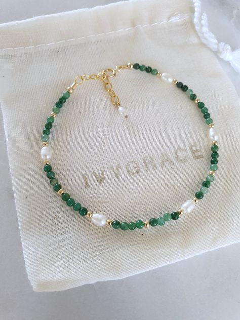 Delicate beaded gemstone bracelet made with tiny dark green, 2mm round Jade beads, freshwater pearls and 2mm round gold-filled beads.   The bracelet is finished with a 14ct gold-filled clasp and extension chain which allows a length between 17-19cm.  Perfect if gifting. ☆ 14ct gold-filled is a high quality, affordable alternative to solid gold.  It consists of a thick layer of gold which is mechanically bonded to the base metal.  With minimal care, gold-filled jewellery can last for years and wi Beaded Necklace Diy, Diy Bracelet Designs, Diy Bracelets Patterns, Beads Bracelet Design, Handmade Jewelry Tutorials, Jewelry Accessories Ideas, Handmade Wire Jewelry, Jewelry Lookbook, Beaded Bracelets Diy