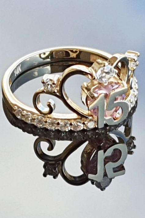 A girl can never have too much jewelry, so let's kick off our list of 15 gorgeous quinceanera gifts with this stunning crown ring. It will look absolutely amazing on the birthday girl's finger and is a gift that she will cherish forever. Silver Quince Rings, 15 Quinceanera Ring, Quinceanera Rings Birthstone, Rings For Quince, 15 Quince Rings, Quinceanera Rings Silver, Quincenera Rings 15, Pink Quince Ring, Sweet 15 Rings