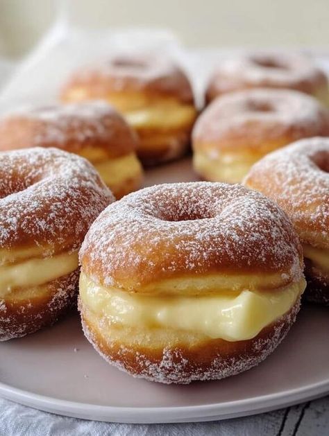 Indulge in These Irresistibly Soft Custard Donuts Recipe - NewsBreak Soft Doughnut Recipe, Custard Donuts Recipe, Custard Donut, Sugar Doughnut Recipe, Custard Donuts, Mounds Bars Recipe, Cream Cheese Bars Recipe, Dessert Favorites, Butter Cake Cookies