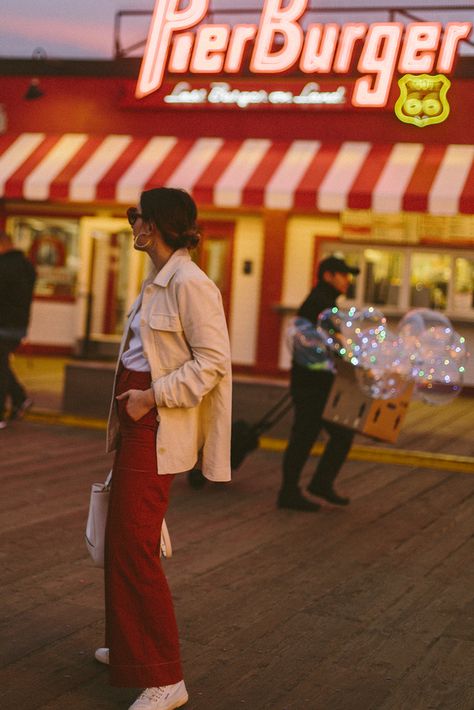 Santa Monica Outfit Winter, Headphones Photoshoot, Outfit Pictures, Summer Carnival, Daisy Bags, Red Trousers, Santa Monica Pier, Winter Capsule, Throw Back