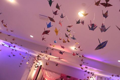 Wedding decoration with paper crane Paper Crane Chandelier, Paper Crane Garland, Decoration With Paper, Dorm Vibes, Male Living Space, Origami Decor, Paper Cranes, Pinterest Contest, Origami Crane