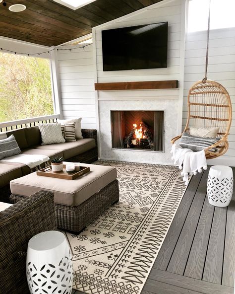 Screened in porch with shiplap gas fireplace, marble surround, composite decking, hanging egg chair and wicker sectional. All Season Room, Four Seasons Room, Screened Porch Designs, Porch Fireplace, Sunroom Designs, Cape Cod House, Screened In Patio, Screen Porch, Outdoor Living Room