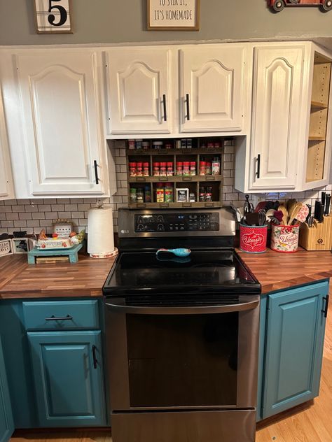 Bpught this shelf at Hobby Lobby and my Hubs altered it to fit above the stove! Beside Stove Cabinet, Spice Organization Above Stove, Behind The Stove Shelf, Spice Shelves Above Stove, Above The Stove Shelf, Spice Shelf Above Stove, Over The Stove Shelf Diy, Above Stove Shelf, Cabinets Above Stove