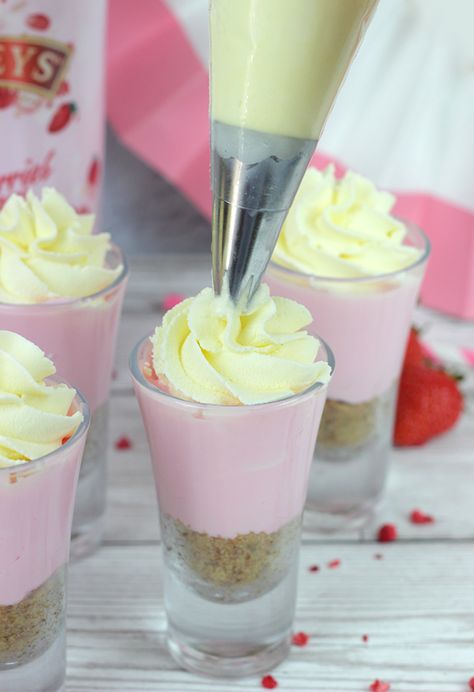 Baileys Strawberries & Cream Cheesecake Shots - Cakey Goodness Pink Cheesecake Shooters, Strawberry Cheesecake Shooters, Love Potion Recipe, Pink Cheesecake, Cheesecake Shots, Strawberry Cups, Cake Shooters, Shower Snacks, Cheesecake Shooters