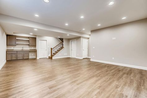 Basement With Laminate Flooring, Light Wood Basement Floor, Tile Floor Basement Ideas, Evp Flooring, Basement Floor Ideas, Flooring Ideas Vinyl, Basement Flooring Ideas, Downstairs Bar, Basement Refinishing