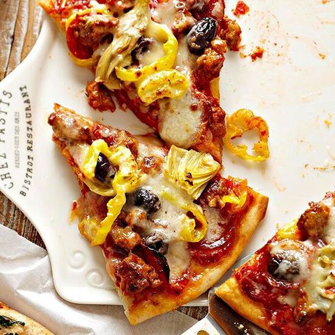 Broccoli Rabe, Garlic, and Mushroom Pizza with Golden Raisins