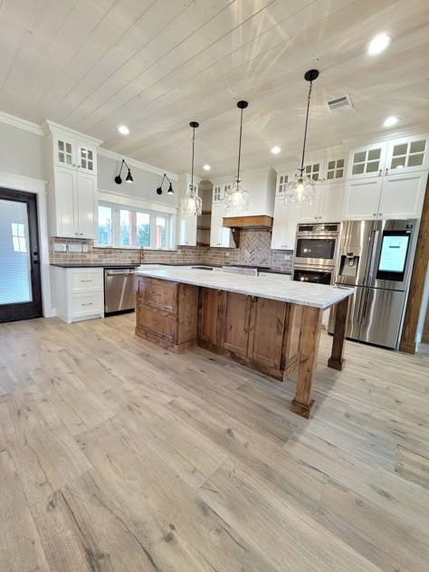 Grey Tone Kitchen Ideas, Modern Farmstyle Kitchen Ideas, Knotty Alder Island With White Cabinets, Island Counter Chairs, Modern Farmhouse Shiplap Walls, Kitchen Layout Farmhouse, Brick Backsplash In Kitchen, Modern Farmhouse Kitchens Cabinets, Barndominium Kitchen Open Concept