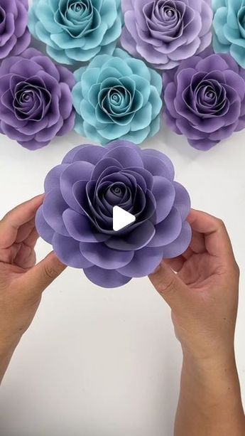 Hey, I’m Judy 👋🏻 Paper Flower Art + Tutorials on Instagram: "In my head, I’ve been calling this rose my “Camellia Rose” and so that’s what I’ve named it. Not an exact Camellia, but the round outer layers look like the round Camellia petals so I’m going for it! Will be posting a tutorial and list the template in my Etsy shop later today 🌸🌺 Isn’t this purple cardstock lovely? I realize I should have made them pink, but I couldn’t resist! #paperflowers #cricut #teamcricut #cricutcreations #make Round Paper Craft, Layered Paper Art Template, Flower Making Crafts, Giant Flowers Diy, Flower Petal Template, Paper Embellishments, Making Fabric Flowers, Paper Flower Art, Flowers Craft