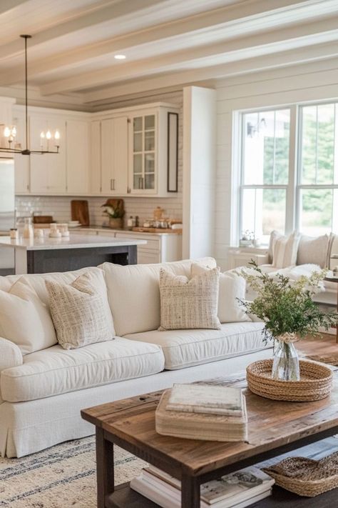 Create a Cozy Retreat with Farmhouse Living Rooms 🛋️✨ Design a warm and inviting living room with farmhouse decor. Use rustic furniture, cozy textiles, and vintage accents for a charming country feel. 🌿🏠 #FarmhouseLivingRoom #HomeDecor #CountryStyle #LivingRoomInspo Apartment Farmhouse Living Room, Light Country Living Room, Modern Country Style Living Room, Country Farmhouse Living Room Ideas, Warm Farmhouse Living Room, Farmhouse Sitting Room, Farm Living Room, White Farmhouse Living Room, Living Rooms Design