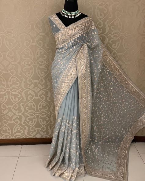 ~ ATIYA COLLECTION ~ This elegant georgette saree features intricate and heavy pitta work, showcasing fine craftsmanship. The detailed embroidery enhances its sophisticated appeal, making it an ideal choice for special occasions. Paired with a stitched blouse, this saree effortlessly combines tradition with modernity, offering both comfort and style. The subtle yet rich design is perfect for those who appreciate timeless elegance…🕊️ {Pre Order 2/6 Weeks •Dm For Purchase/Enquiries} ~Plea... Fancy Saree, Cute Cardigan Outfits, Saree Blouse Styles, Simple Saree Designs, Indian Sari Dress, Sari Dress, Fancy Sarees Party Wear, Simple Sarees, Indian Fashion Saree