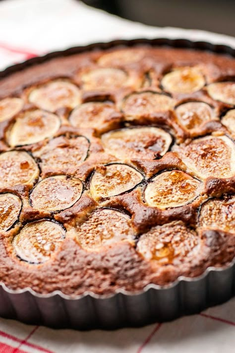 NYT Cooking: Figs are baked into an almond batter for this rustic cake to have with coffee or tea. With figs, ripeness is everything. A ripe fig (the object of your desire) is soft, yielding, beginning to crack, nearly wrinkled. When you cut into it, the flesh is bright and juicy and the taste is ethereal. Pear And Almond Cake, حلويات عربية, Fig Cake, Almond Cake Recipe, Fig Recipes, Torte Cupcake, Slow Cooker Desserts, Almond Cake, Nyt Cooking