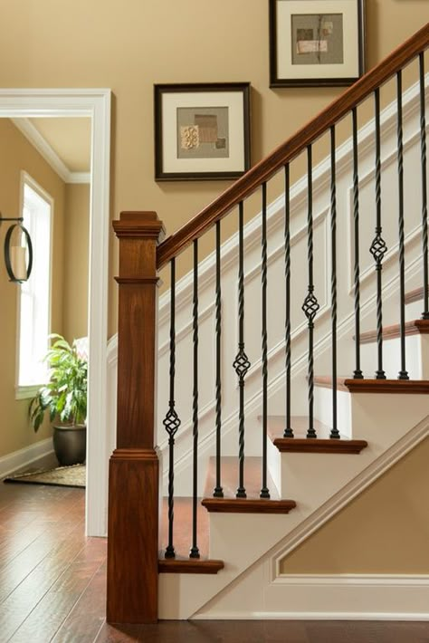 Craftsman Staircase with High ceiling, Wainscotting, Chair rail, Hardwood floors Stairway Railing Ideas, Craftsman Staircase, Stairway Ideas, Wrought Iron Stair Railing, Stair Banister, Stair Rails, Stair Ideas, Iron Stair Railing, Wrought Iron Stairs