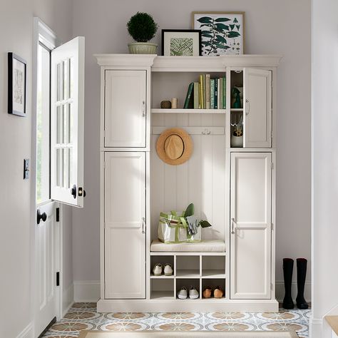 A white classic hall tree with cabinets, cubbies and shelves in an entryway. Hall Tree Pantry Combo, Hall Tree In Kitchen, Hall Tree With Cabinets, Hall Tree Entryway Diy Farmhouse, Modern Hall Tree Entryway, Hall Tree Entryway Diy, Modern Hall Tree, Narrow Hall Tree, Rustic Hall Trees